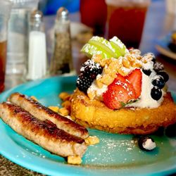 Blue Moon Cafe - Capt Crunch French Toast with Turkey Sausage, scrambled Eggs, and Fresh Fruit!