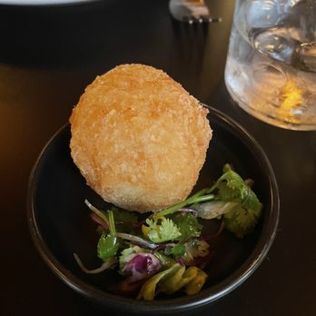 Vinai - Curry Rice Ball - warm curry flavor with a perfect compliment of garlic cream cheese. - New American Near Me - Minneapolis, Minnesota Vinai - Curry Rice Ball - warm curry flavor with a perfect compliment of garlic cream cheese. - New American Near Me - Minneapolis, Minnesota