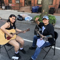 Brooklyn Guitar School - Shantal teaching at the street fair.