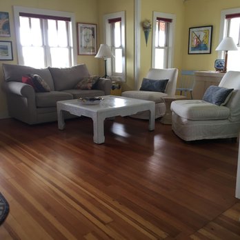 Dawley Flooring & Tile - Three rooms come together into one space in Oak Bluffs seaside cottage. - Flooring Near Me - Oak Bluffs, Massachusetts