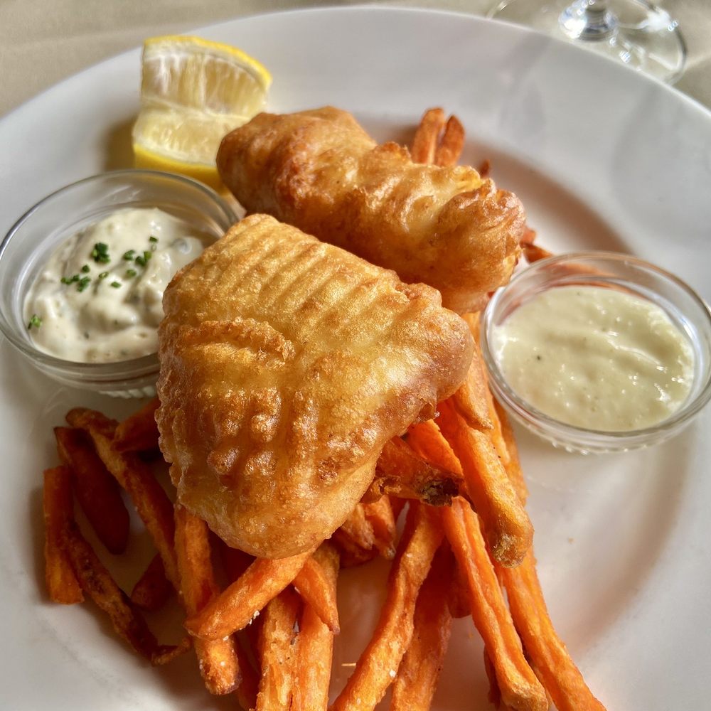 The Oyster Bar - Beer-battered Alaskan halibut with sweet potato fries, garlic aioli, and tartar sauce - Seafood Near Me - Bow, Washington The Oyster Bar - Beer-battered Alaskan halibut with sweet potato fries, garlic aioli, and tartar sauce - Seafood Near Me - Bow, Washington