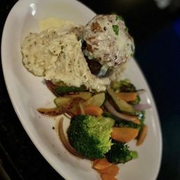 Smoked tenderloin topped with a crab cake- garlic cream sauce, garlic mash, and veggies! Smoked tenderloin topped with a crab cake- garlic cream sauce, garlic mash, and veggies!