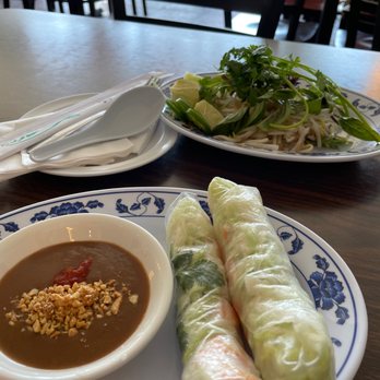 Little Saigon Cafe - Spring roll and set up for the pho - Vietnamese Near Me - Orange Park, Florida Little Saigon Cafe - Spring roll and set up for the pho - Vietnamese Near Me - Orange Park, Florida