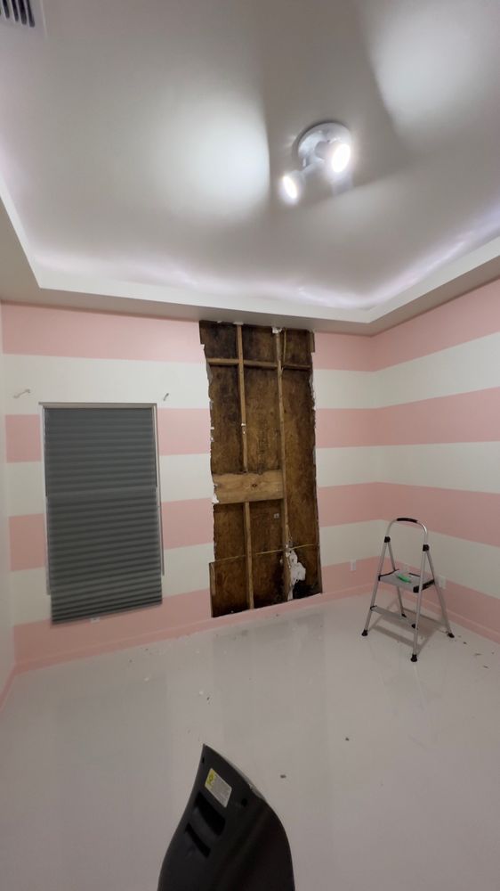 Slide of Vela's Roofing and Construction