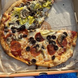 Blaze Pizza - Classic red sauce and mozzarella. Half:pepperoni, olives, mushrooms; half: artichoke hearts, peppercinis, olives, mushrooms.