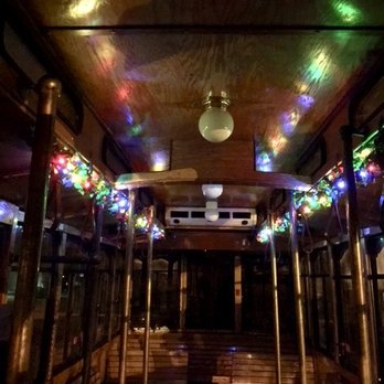 Siesta Trolley - Holiday lights glow throughout December tours. - Wedding Planning Near Me