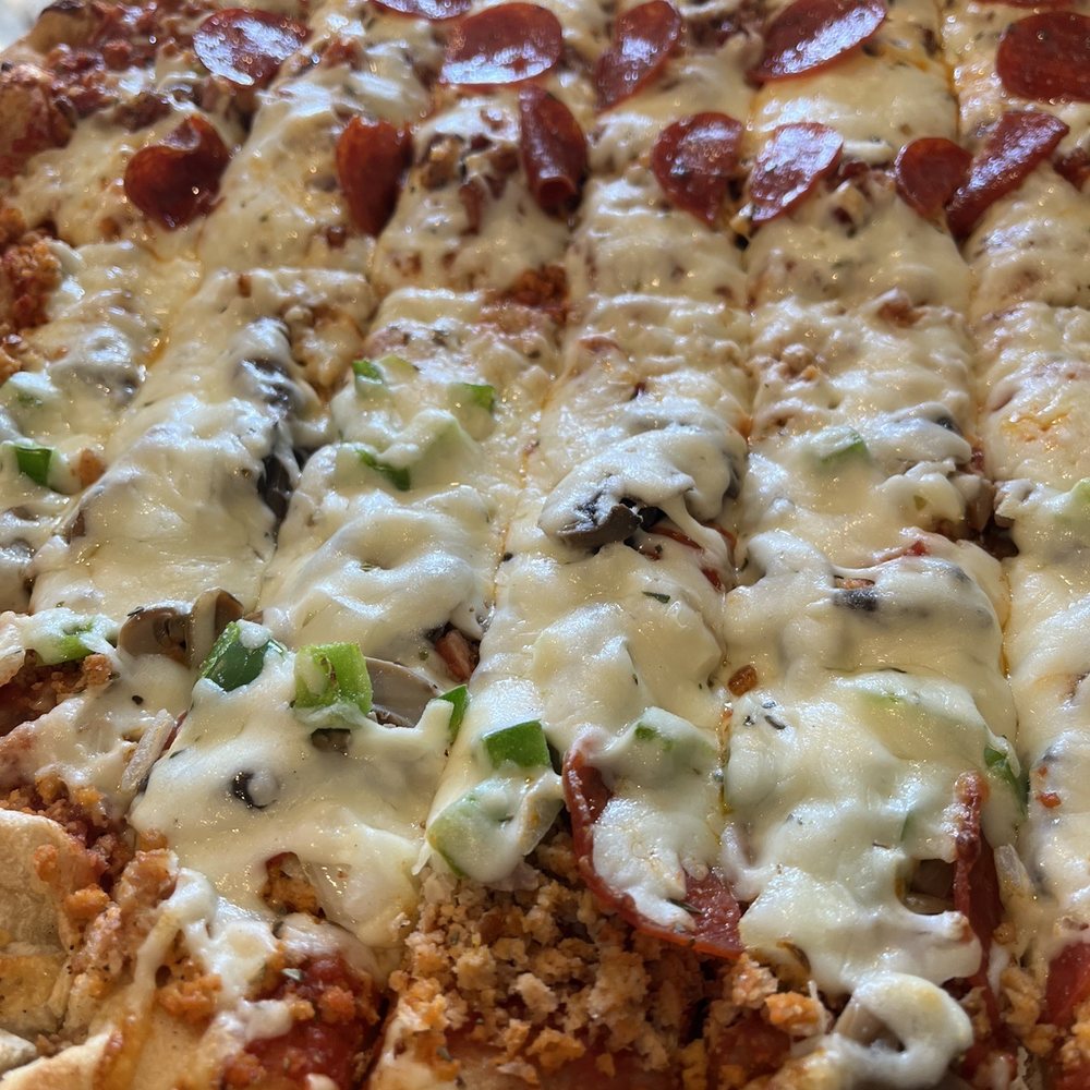 Clint's Pizza - 1/2 Daytona 21 Pizza; 1/2 Garden Pizza - Bars Near Me - Moline, Illinois