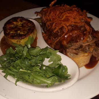 Leon's Full Service - beef brisket | slow roasted, black peppercorn gravy, fried onions, served open faced  | AMAZING! The meat was so tender - Gastropubs Near Me - Decatur, Georgia