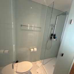 Shower toilet closet in room