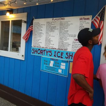 Shorty's Ice Shack - a man and a woman standing outside - Shaved Ice Near Me - Severn, Maryland Shorty's Ice Shack - a man and a woman standing outside - Shaved Ice Near Me - Severn, Maryland