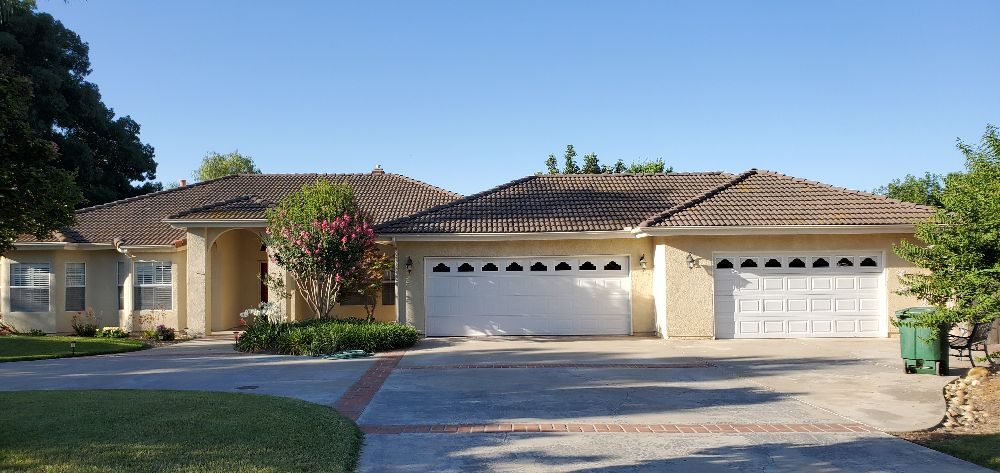 Slide of Revival Roofing