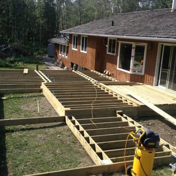 Western Living Landscapes - a deck being built - Snow Removal Near Me Western Living Landscapes - a deck being built - Snow Removal Near Me