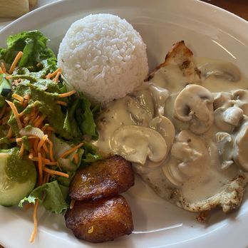 Mi Pueblito - Grilled chicken w/ creamy mushroom, rice, salad & raw plantain. - Colombian Near Me - Houston, Texas Mi Pueblito - Grilled chicken w/ creamy mushroom, rice, salad & raw plantain. - Colombian Near Me - Houston, Texas