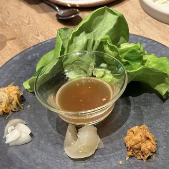 Isidore - Dipping sauce, pickles, and lettuce--goes with the roasted lion's mane mushroom - New American Near Me - San Antonio, Texas Isidore - Dipping sauce, pickles, and lettuce--goes with the roasted lion's mane mushroom - New American Near Me - San Antonio, Texas