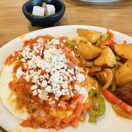 Huevos Rancheros w house potatoes. You can get rice and beans instead if preferred. Huevos Rancheros w house potatoes. You can get rice and beans instead if preferred.