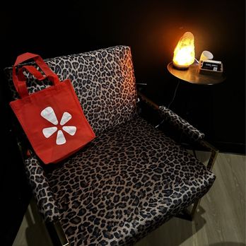 Jade Salon - Midtown - Cool chair in facial room with yelp bag accent - Hair Salons Near Me - Greensboro, North Carolina Jade Salon - Midtown - Cool chair in facial room with yelp bag accent - Hair Salons Near Me - Greensboro, North Carolina
