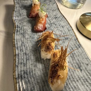 Torii Japanese Inspired - Truffle Tuna nigiri (back), Buttered Scallop nigiri (front) - Japanese Near Me - Katy, Texas Torii Japanese Inspired - Truffle Tuna nigiri (back), Buttered Scallop nigiri (front) - Japanese Near Me - Katy, Texas