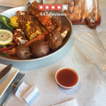 Crab Avenue - King crabs , potatoes , corn and Easy Peel Shrimp with fire sauce on side . My review is 5 stars - Seafood Near Me - Glendale, California
