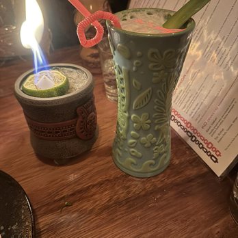 Tiki Kai - Jet Pilot (left) and an Ube Your Thirst (subbed rum in place of vodka - right) - Tiki Bars Near Me - Hermosa Beach, California Tiki Kai - Jet Pilot (left) and an Ube Your Thirst (subbed rum in place of vodka - right) - Tiki Bars Near Me - Hermosa Beach, California