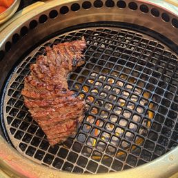 Galbi being cooked Galbi being cooked