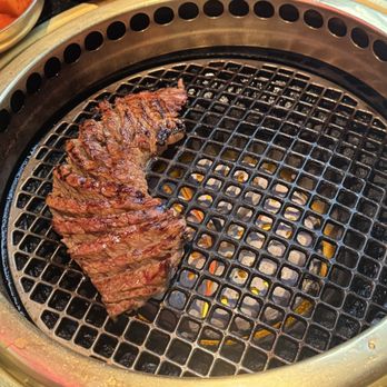 COTE Korean Steakhouse - Galbi being cooked - Korean Near Me - New York, New York COTE Korean Steakhouse - Galbi being cooked - Korean Near Me - New York, New York