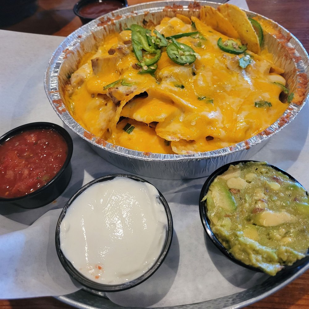 Hondo's - Nacho construction - Bars Near Me - Fredericksburg, Texas