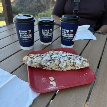 River Rock Roasting Co - Almond Croissant, Carmel macchiato, macha tea, latte - Coffee & Tea Near Me - La Verkin, Utah River Rock Roasting Co - Almond Croissant, Carmel macchiato, macha tea, latte - Coffee & Tea Near Me - La Verkin, Utah