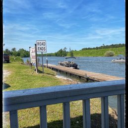 a sign on a pier a sign on a pier