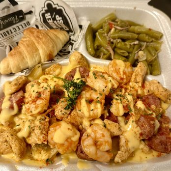 Chrissy’s Cajun Kitchen - RAGin Cajun pasta: includes shrimp, chicken and sausage served with green beans and crescent roll - Cajun/Creole Near Me - Alexandria , Louisiana Chrissy’s Cajun Kitchen - RAGin Cajun pasta: includes shrimp, chicken and sausage served with green beans and crescent roll - Cajun/Creole Near Me - Alexandria , Louisiana
