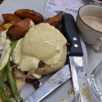 Millie's Mimosa House & Eatery - Duck confit benny - Breakfast & Brunch Near Me - Babylon, New York Millie's Mimosa House & Eatery - Duck confit benny - Breakfast & Brunch Near Me - Babylon, New York