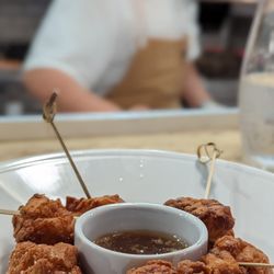 The Library Kitchen & Bar - Main Lobster Tail lolli pops with Jack Daniels sauce
