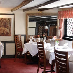 Nizam Bar & Restaurant - The Main Dinning Room at Nizam Indian exposed original timber beams
