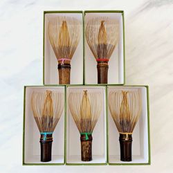 LYC Japanese Artisan Gifts - Our Chasen come with many different thread colors. These are the black bamboo kind made by Ryosai Kubo in Takayama, Nara, Japan!