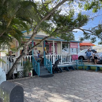Heavenly Biscuit - people sitting outside of a small house - Breakfast & Brunch Near Me - Fort Myers Beach, Florida Heavenly Biscuit - people sitting outside of a small house - Breakfast & Brunch Near Me - Fort Myers Beach, Florida