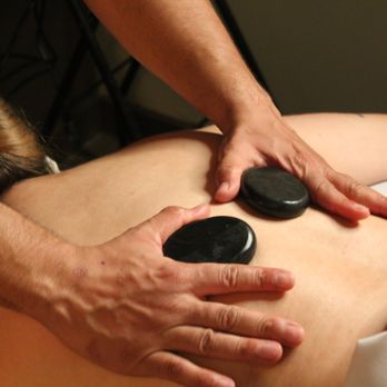 Elements Massage - Melt away tension with a soothing Hot Stone Massage  Warm stones relieve stress and soothe muscles for ultimate relaxation - Massage Near Me - San Mateo, California