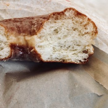 Doughnut Vault - Cross section of Chestnut glazed yeasted donut - Donuts Near Me - Chicago, Illinois Doughnut Vault - Cross section of Chestnut glazed yeasted donut - Donuts Near Me - Chicago, Illinois