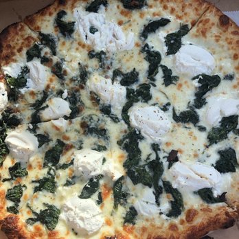 Pizzoodles - White pizza, spinach, garlic purée and ricotta. - Italian Near Me - Vero Beach, Florida Pizzoodles - White pizza, spinach, garlic purée and ricotta. - Italian Near Me - Vero Beach, Florida