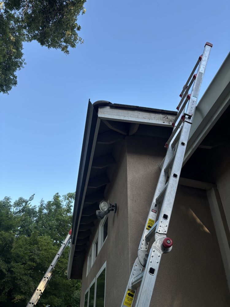 Slide of Port City Gutter Cleaning & Installation