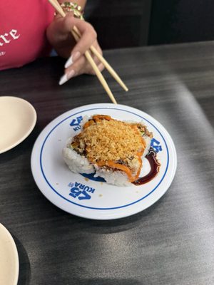 Kura Revolving Sushi Bar by null