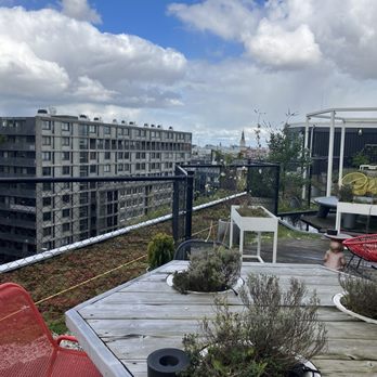 Zoku Amsterdam - Outdoor patio area/ community space - Hotels Near Me - Amsterdam, New Hampshire Zoku Amsterdam - Outdoor patio area/ community space - Hotels Near Me - Amsterdam, New Hampshire
