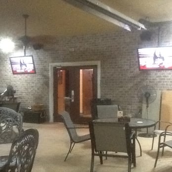 Aiello's Cigar Bar - They have a covered patio (heated) with flat screens, and a view of the Bocce Courts.  Pretty relaxing place to watch the Cards. - Bars Near Me - Cottleville, Missouri