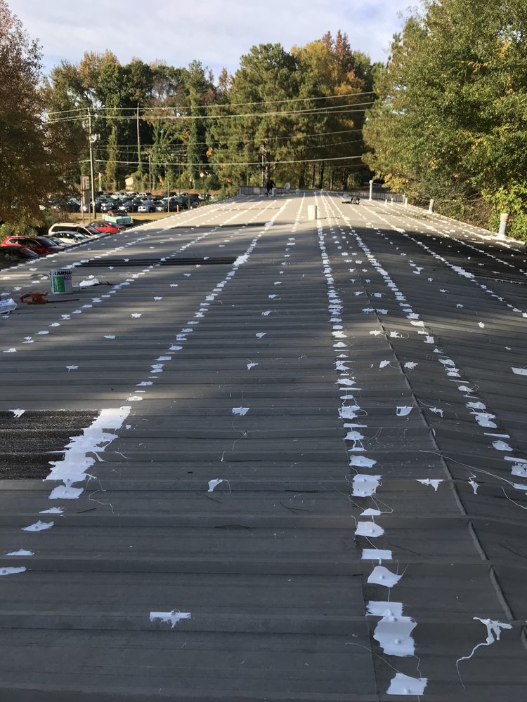 Slide of Advanced Roofing & Paving