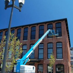 Window Cleaning Crew - Bates Mill, Lewiston, Maine. Utilizing boom lift and 5 stage water filtration system for spot free windows.