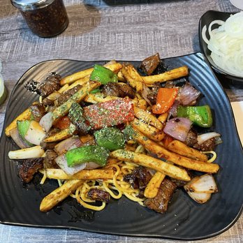 Pholuscious - Krystal recommended the garlic noodles with beef. Super flavorful and I would get this again. - Vietnamese Near Me - Huntington Beach, California