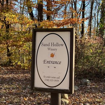 Sand Hollow Winery - a sign in the woods - Wine Tasting Room Near Me - Heath, Ohio Sand Hollow Winery - a sign in the woods - Wine Tasting Room Near Me - Heath, Ohio