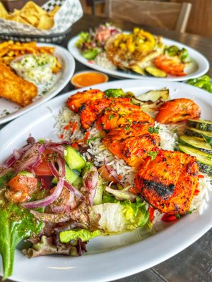 Photo of Fresh Off The Boat Fish Grill - Santa Ana, CA, US. Chicken Kabob entree:
Basmati rice, veggies, salad and garlic sauce