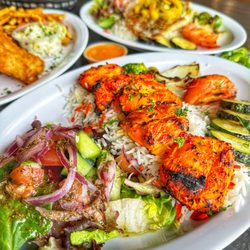 Fresh Off the Boat Fish Grill - Chicken Kabob entree: Basmati rice, veggies, salad and garlic sauce
