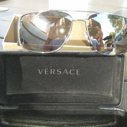 Sunglass Hut - New Versace's for me and Prada's for her