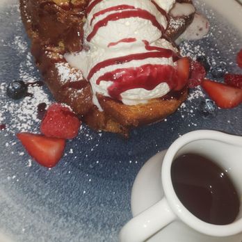 Sveta - Fluffy French toast with strawberries and blueberries - Modern European Near Me - New York, New York Sveta - Fluffy French toast with strawberries and blueberries - Modern European Near Me - New York, New York