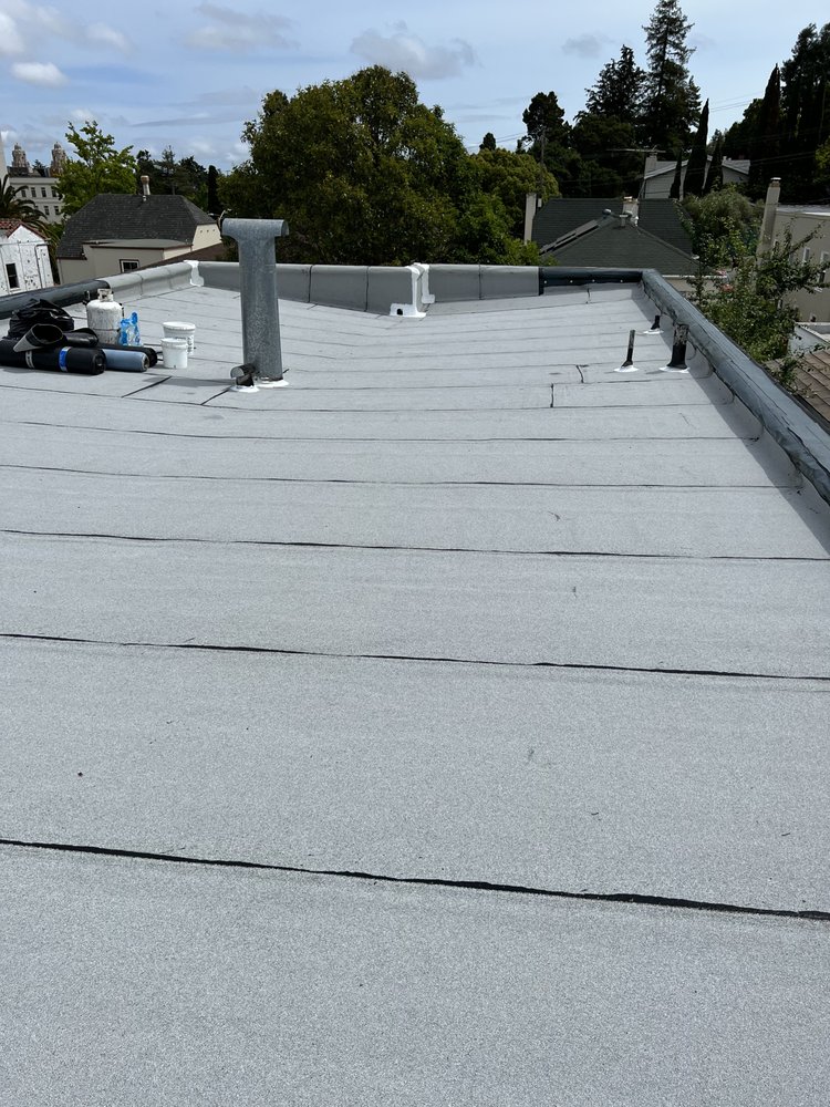 Slide of Manny's Roofing Inc